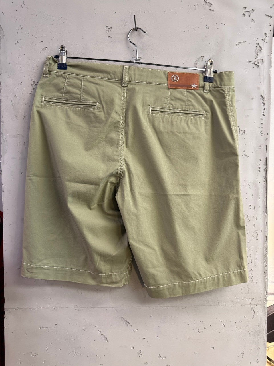 BERLIN VINTAGE CORNER Bogner sage green cotton casual shorts with contrast stitching and leather brand patch on back.