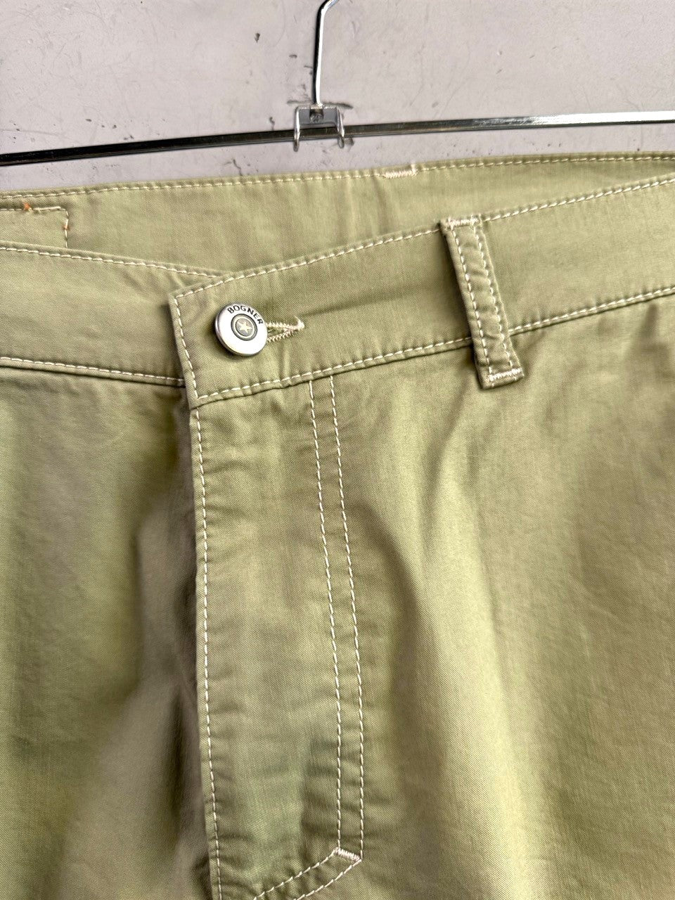 BERLIN VINTAGE CORNER Bogner sage green cotton shorts with contrast stitching and branded button closure.