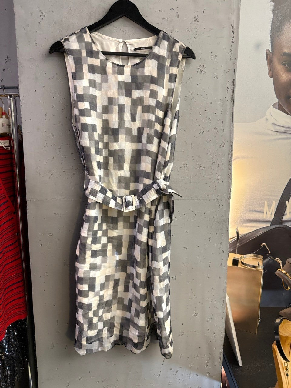 BERLIN VINTAGE CORNER BOSS sleeveless midi dress with monochrome abstract checkerboard print and matching waist belt.