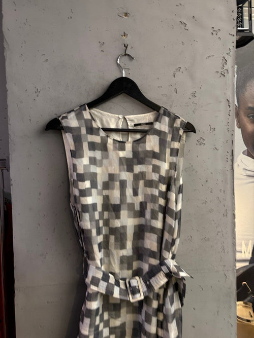 BERLIN VINTAGE CORNER BOSS sleeveless midi dress in a monochrome abstract geometric checkerboard print with a belt.