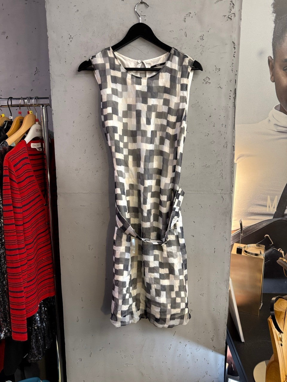 BERLIN VINTAGE CORNER BOSS sleeveless dress in a black, white, and grey geometric block print with a waist tie.