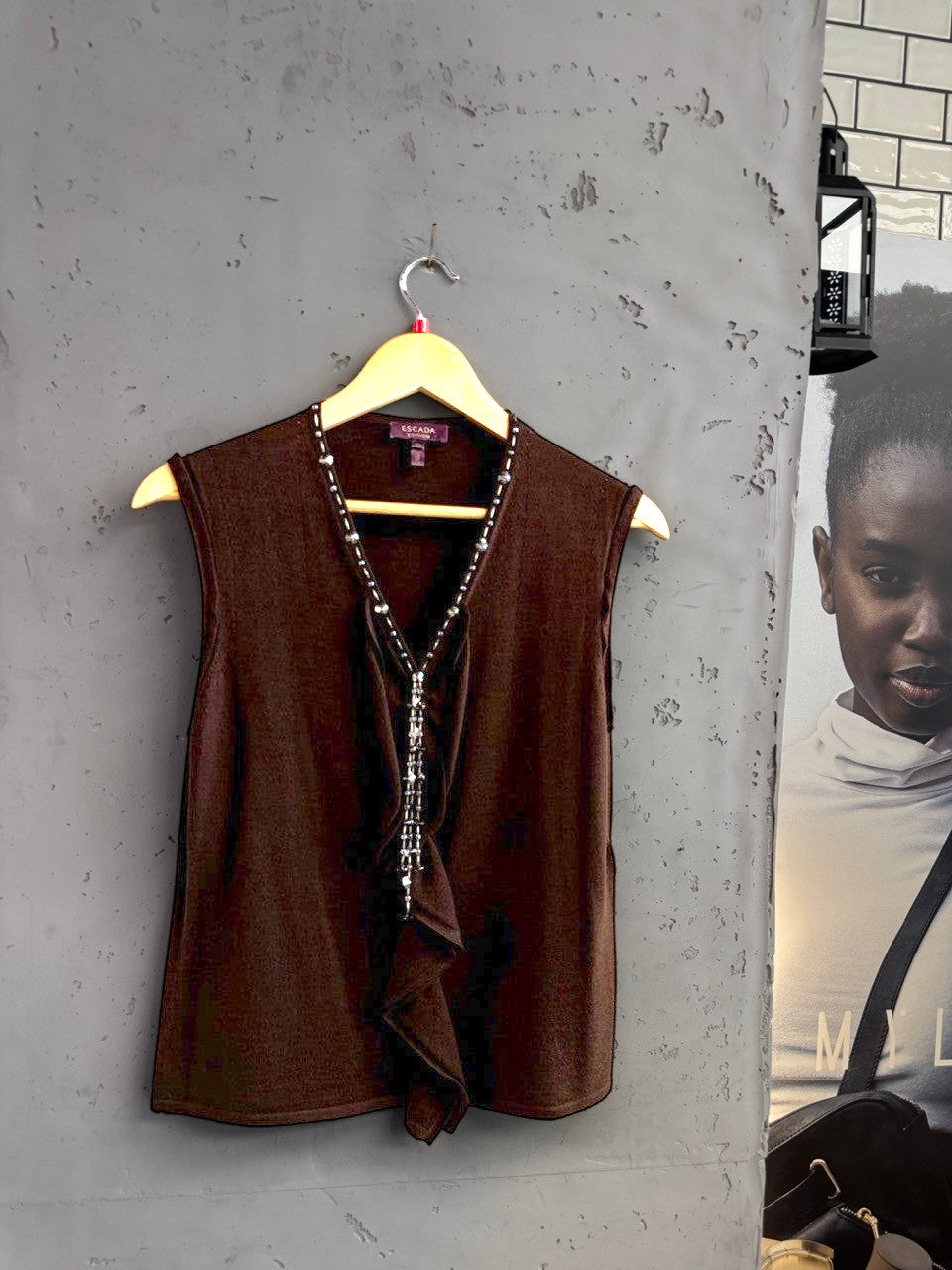 BERLIN VINTAGE CORNER sleeveless knit vest in chocolate brown with beaded V-neckline and cascading embellishment.
