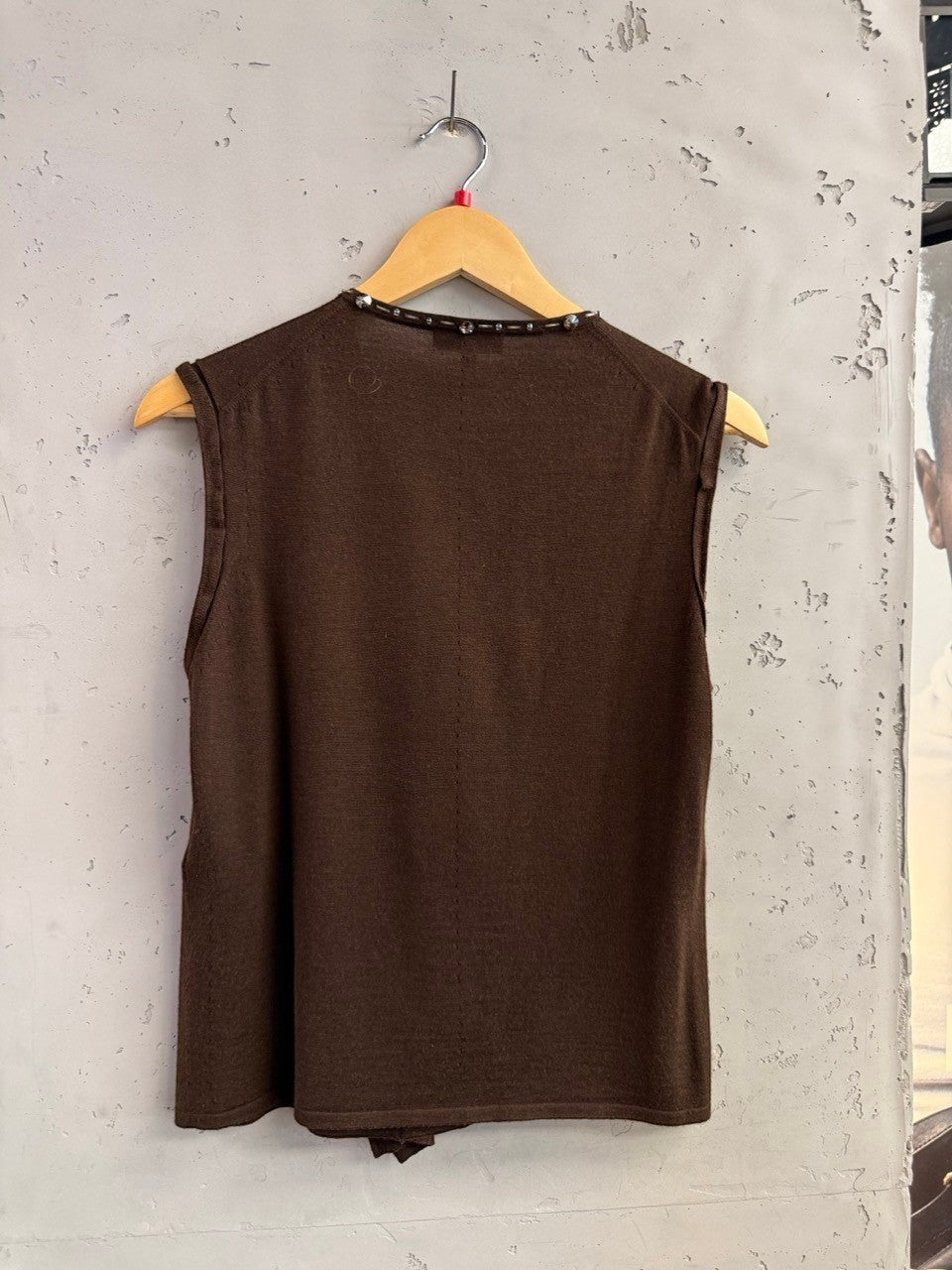 BERLIN VINTAGE CORNER sleeveless knit vest in chocolate brown with beaded V-neckline. Soft knit fabric.