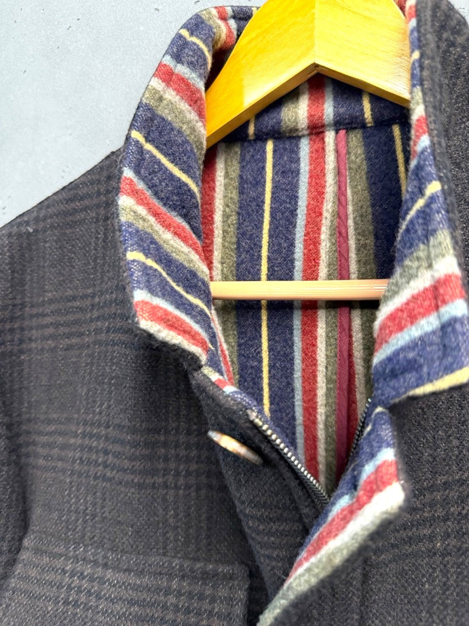 BERLIN VINTAGE CORNER brown plaid wool blend field jacket with a colorful striped lining and flap pockets.