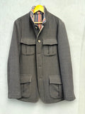 BERLIN VINTAGE CORNER brown plaid wool blend field jacket with striped lining and four flap pockets.