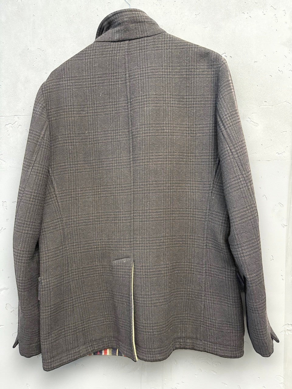 BERLIN VINTAGE CORNER brown plaid wool blend field jacket with striped lining and flap pockets.