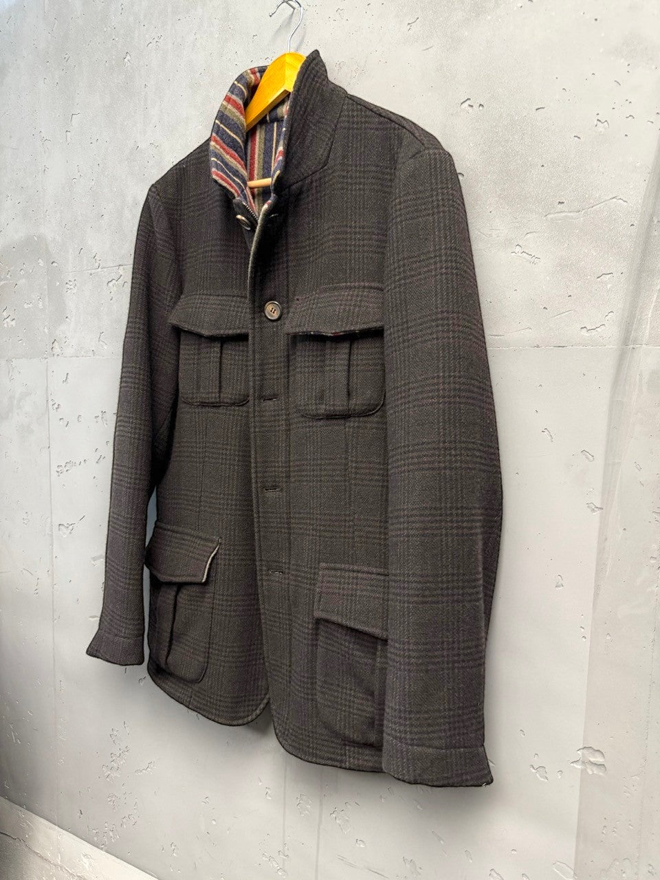 BERLIN VINTAGE CORNER brown plaid wool blend field jacket with striped lining and four flap pockets.