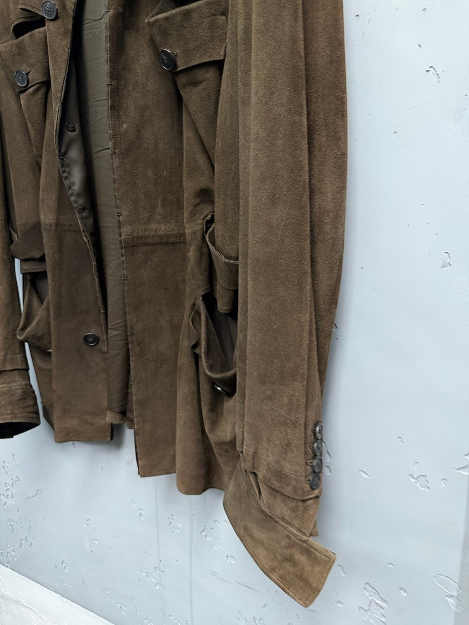 BERLIN VINTAGE CORNER brown suede utility jacket with multiple pockets and button details.