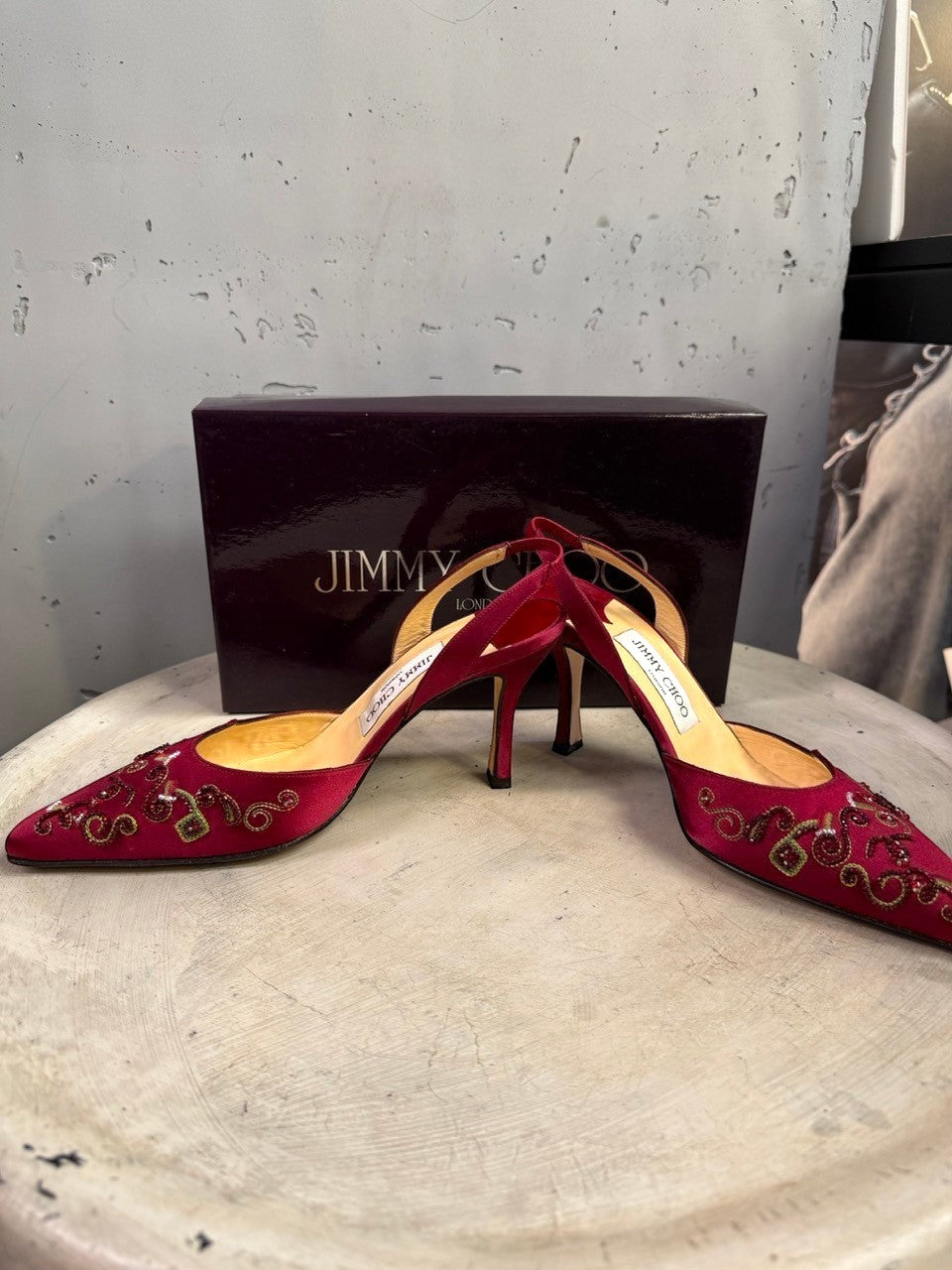 BERLIN VINTAGE CORNER burgundy satin Jimmy Choo slingback heels with intricate beadwork and pointed toes.