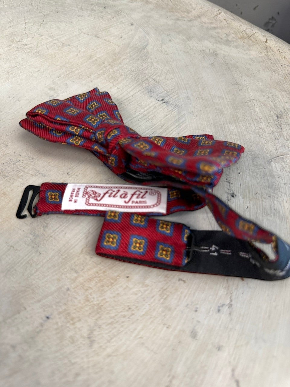 BERLIN VINTAGE CORNER burgundy silk bow tie with blue squares and gold floral pattern, adjustable strap, made in France.