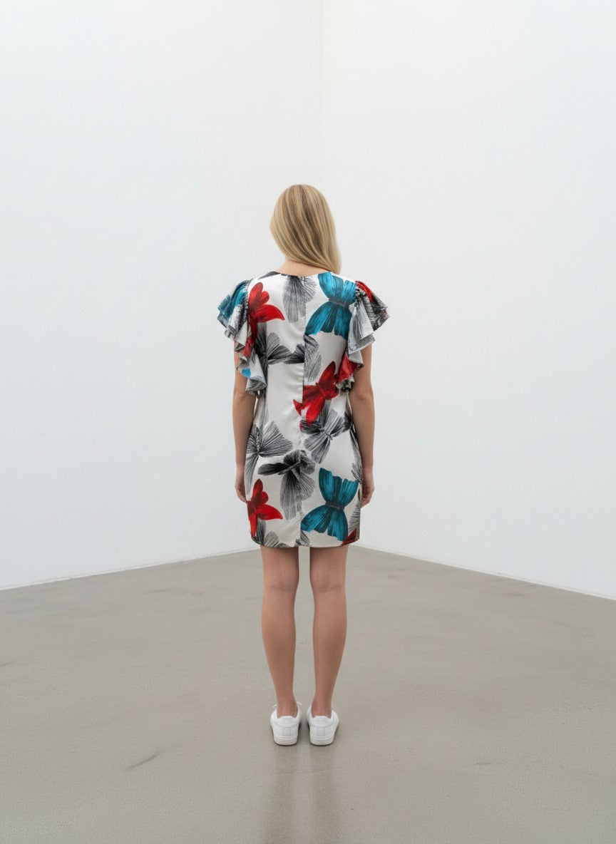 BERLIN VINTAGE CORNER white silk blend dress with butterfly print, ruffled sleeves, red, blue, and black accents.