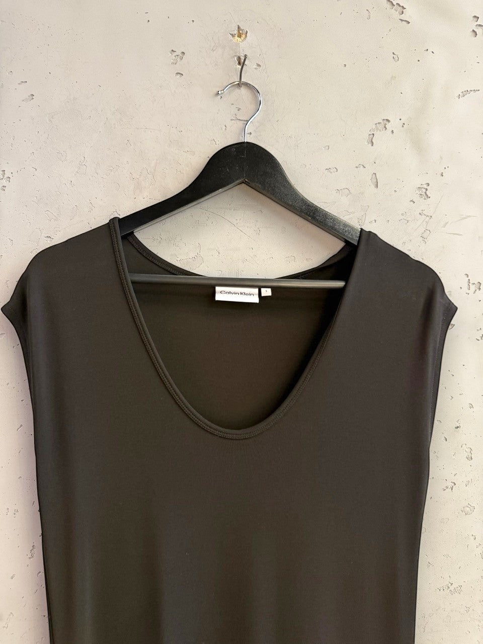 BERLIN VINTAGE CORNER black Calvin Klein sleeveless midi dress with a classic V-neckline on a hanger