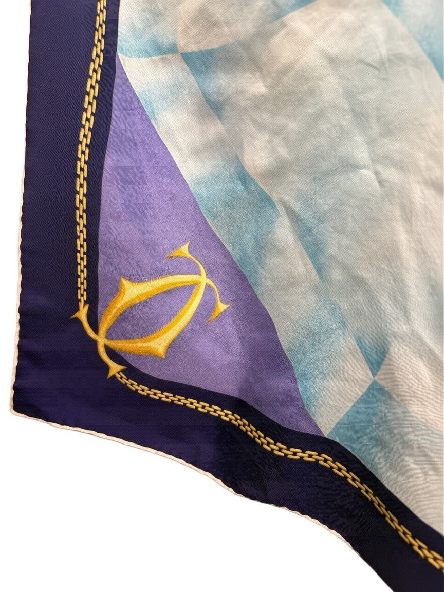 BERLIN VINTAGE CORNER Cartier Paris silk scarf in blue, purple, and light blue with gold chain border and logo.