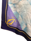 BERLIN VINTAGE CORNER Cartier Paris silk scarf in blue, purple, and light blue with gold chain border and logo.