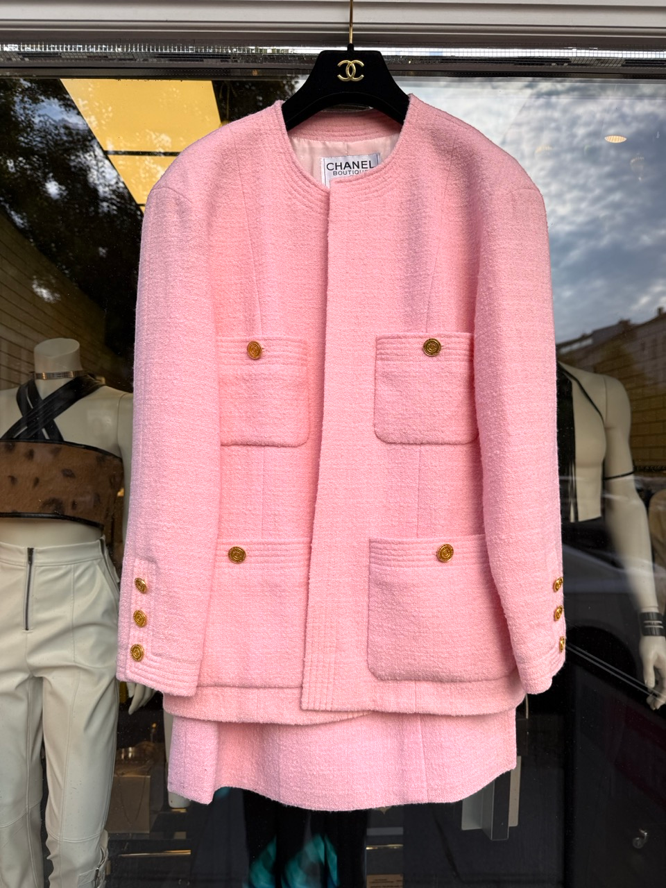 BERLIN VINTAGE CORNER Chanel pink tweed suit, jacket and skirt shown together.