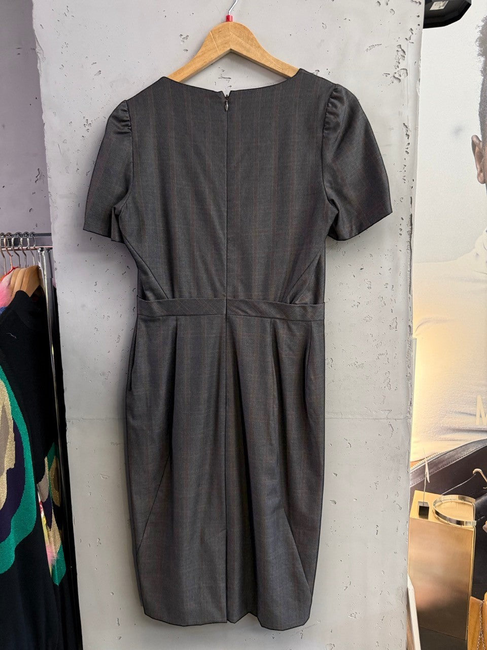 BERLIN VINTAGE CORNER charcoal grey pinstripe midi dress with short puffed sleeves and V-neckline.