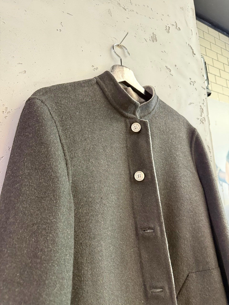 BERLIN VINTAGE CORNER charcoal grey wool blend band collar jacket with light grey trim and button closure.
