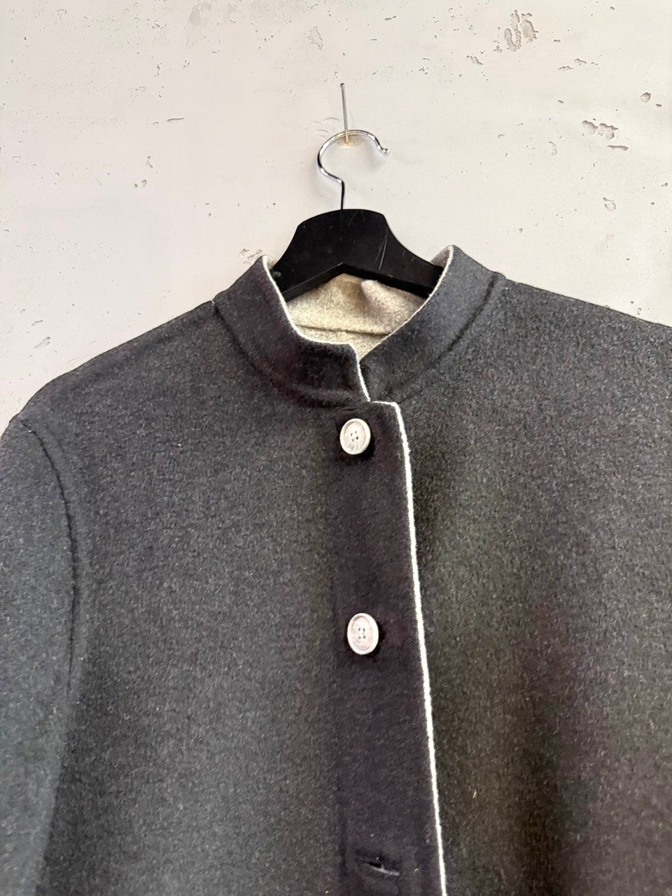 BERLIN VINTAGE CORNER charcoal grey wool blend band collar jacket with light grey trim and two buttons.