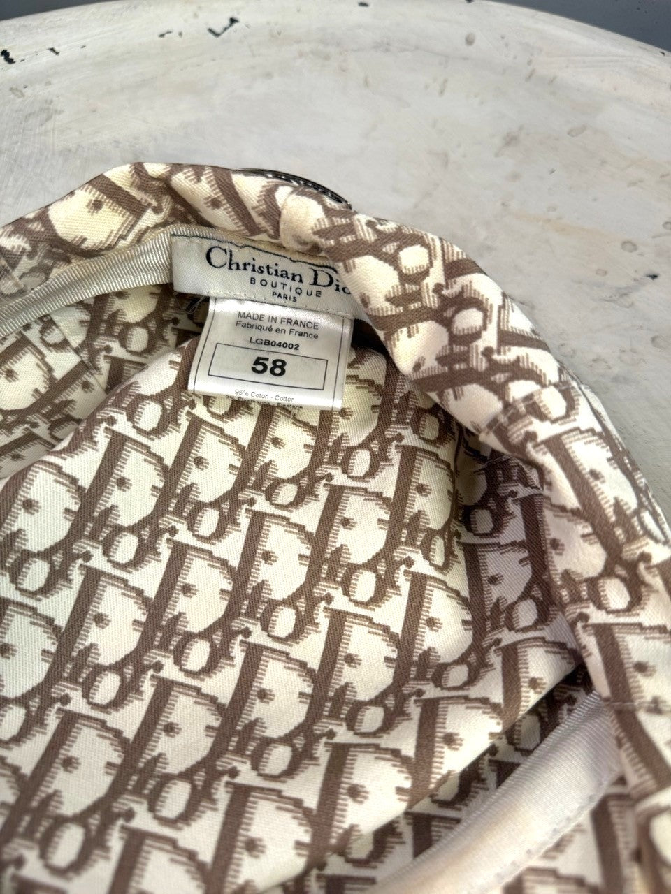 BERLIN VINTAGE CORNER Christian Dior monogram canvas flat cap interior label showing size 58 and cotton material
