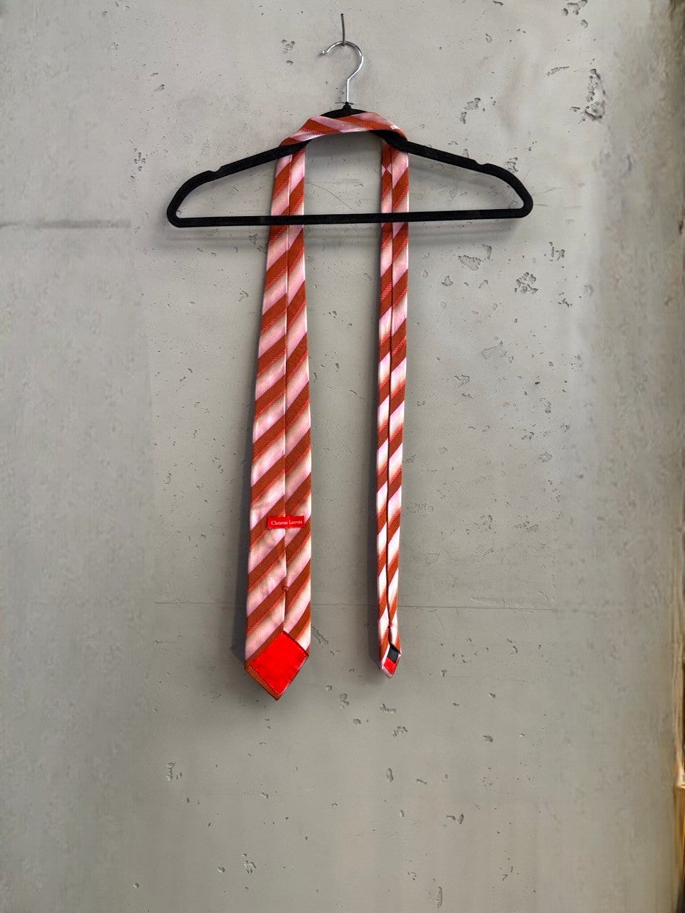 BERLIN VINTAGE CORNER Christian Lacroix pink and burnt orange striped silk necktie with diagonal pattern.