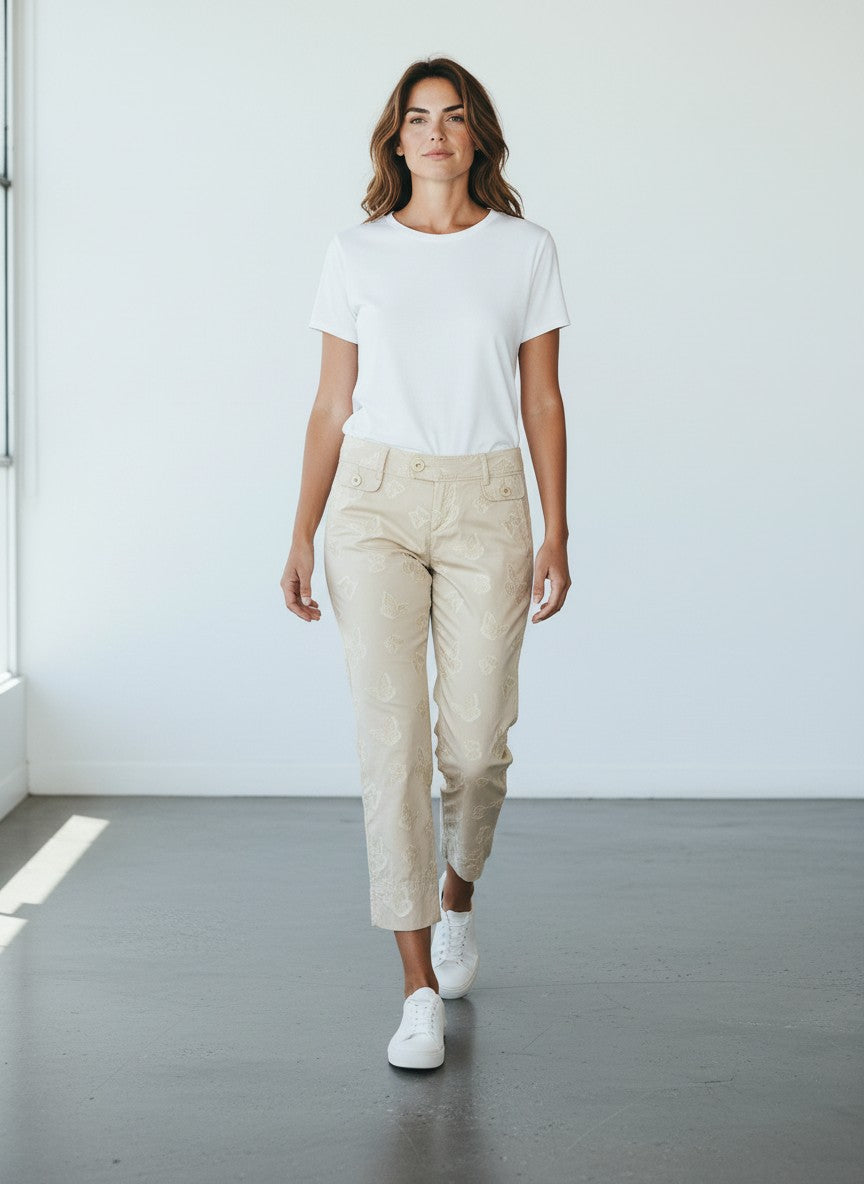 BERLIN VINTAGE CORNER cream trousers with all-over embroidered butterflies, button-fly closure, and tailored fit.