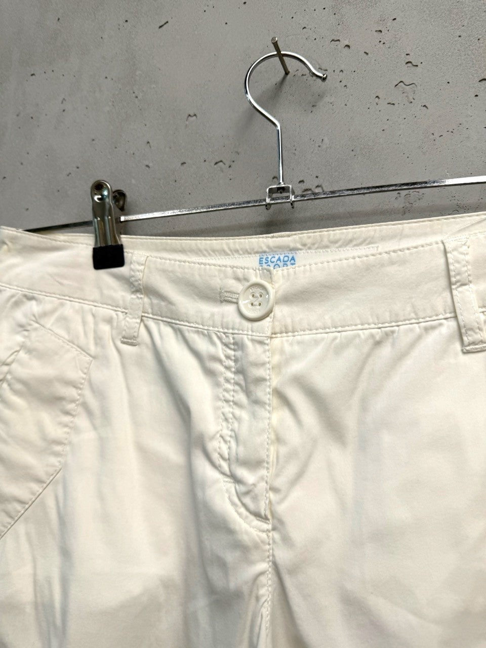 BERLIN VINTAGE CORNER cream cotton blend Bermuda shorts with button detail on cuffs and front pockets.