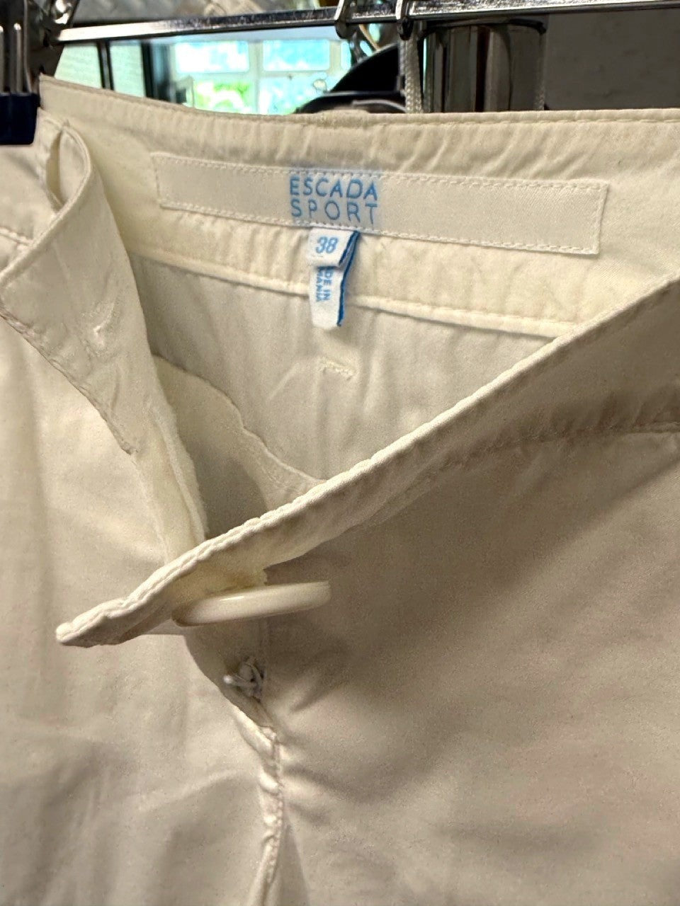 BERLIN VINTAGE CORNER cream cotton blend bermuda shorts with button cuff details and front pockets.