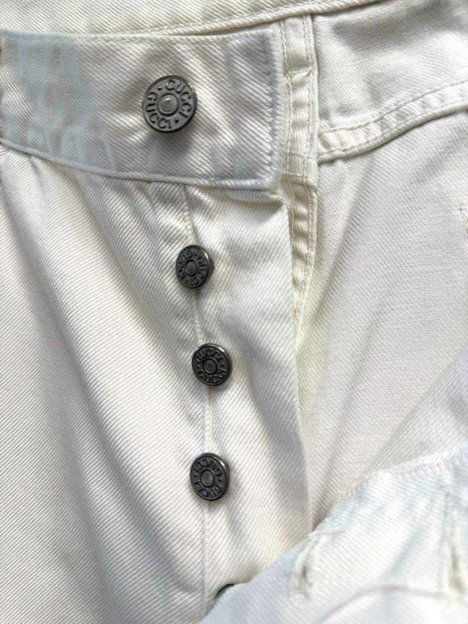 BERLIN VINTAGE CORNER cream denim jeans with button fly and five-pocket design.