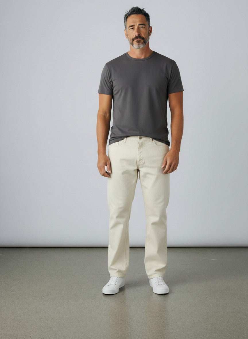 BERLIN VINTAGE CORNER classic cream relaxed fit cotton denim jeans with five-pocket design and button-zip fly.