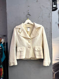 BERLIN VINTAGE CORNER cream tailored blazer with tonal floral jacquard texture, wide collar, and front button pockets.