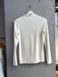 BERLIN VINTAGE CORNER cream ribbed mock neck long sleeve top with shoulder embellishments