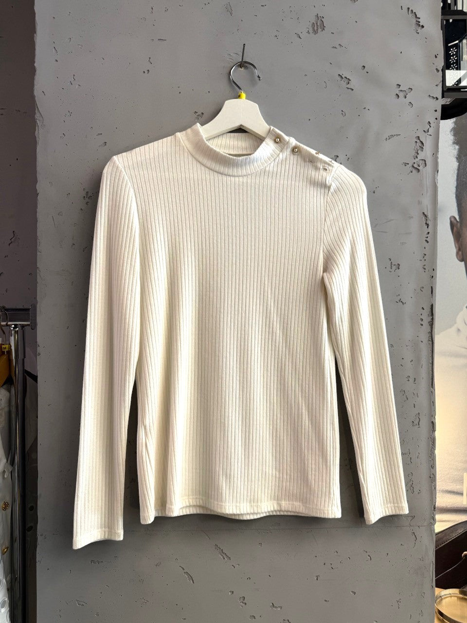 BERLIN VINTAGE CORNER cream ribbed mock neck long sleeve top with shoulder embellishments