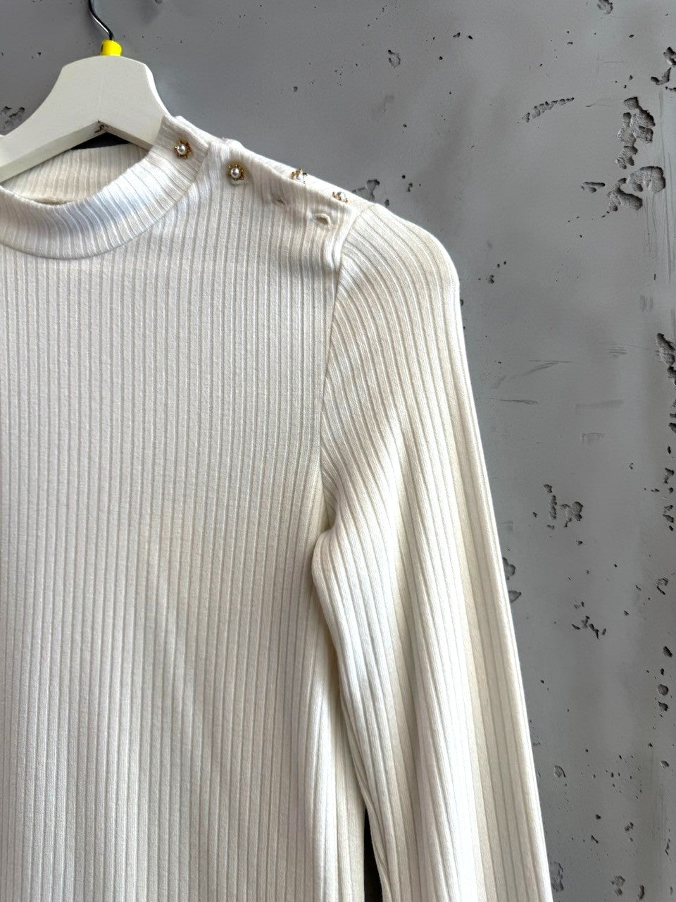 BERLIN VINTAGE CORNER cream ribbed mock neck long sleeve top with pearl button shoulder embellishments