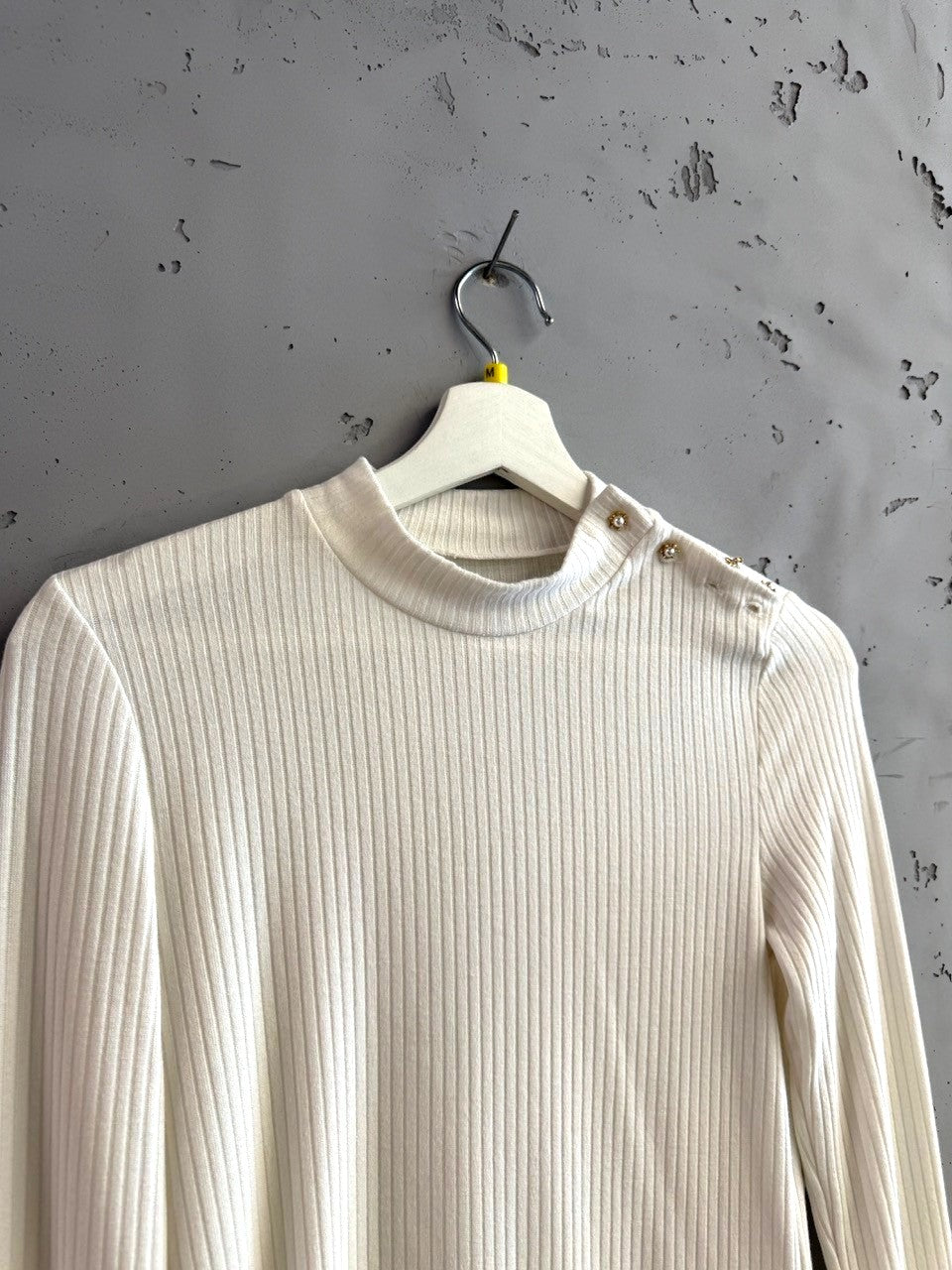 BERLIN VINTAGE CORNER cream ribbed mock neck long sleeve top with shoulder button embellishments