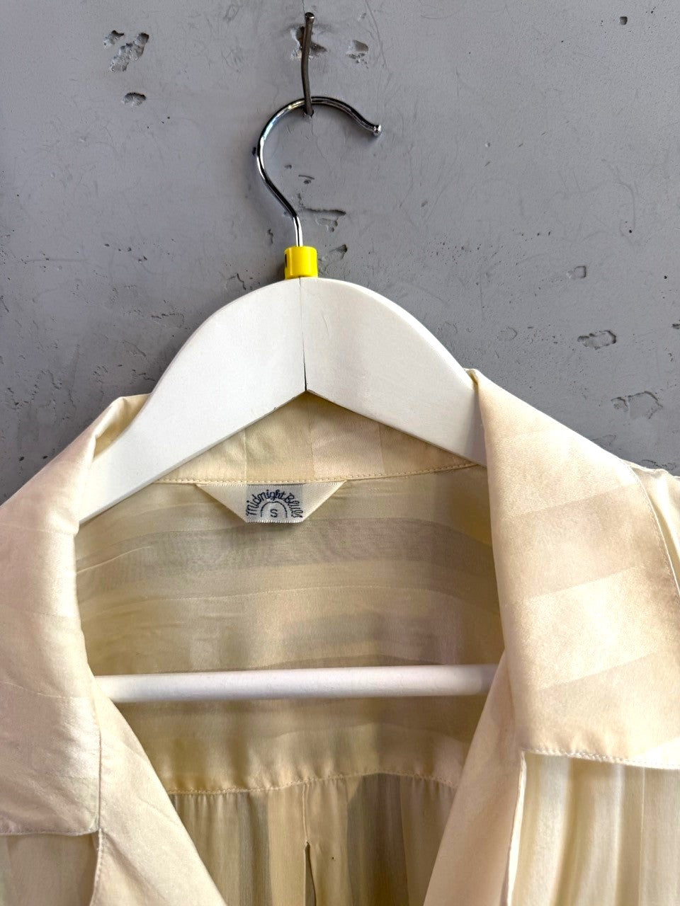BERLIN VINTAGE CORNER cream button-down shirt with tonal stripes and a classic collar on a white hanger.