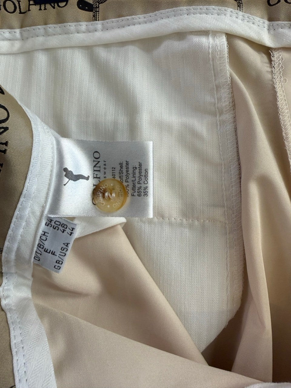 BERLIN VINTAGE CORNER cream tailored trousers featuring Golfino branding, button closure, and interior care labels.