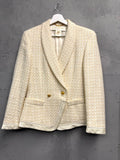 BERLIN VINTAGE CORNER cream textured tweed double-breasted blazer with gold buttons and contrasting trim.