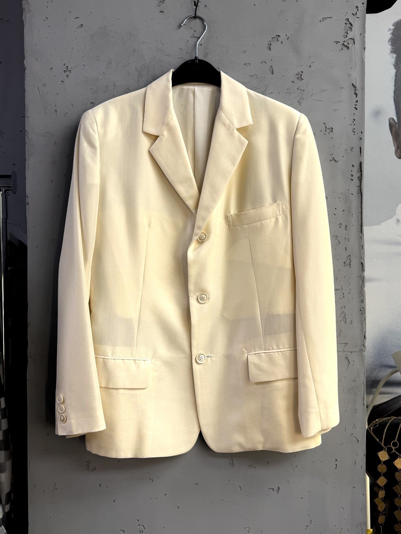 BERLIN VINTAGE CORNER cream Yohji Yamamoto tailored blazer with notched lapels and three-button front closure.