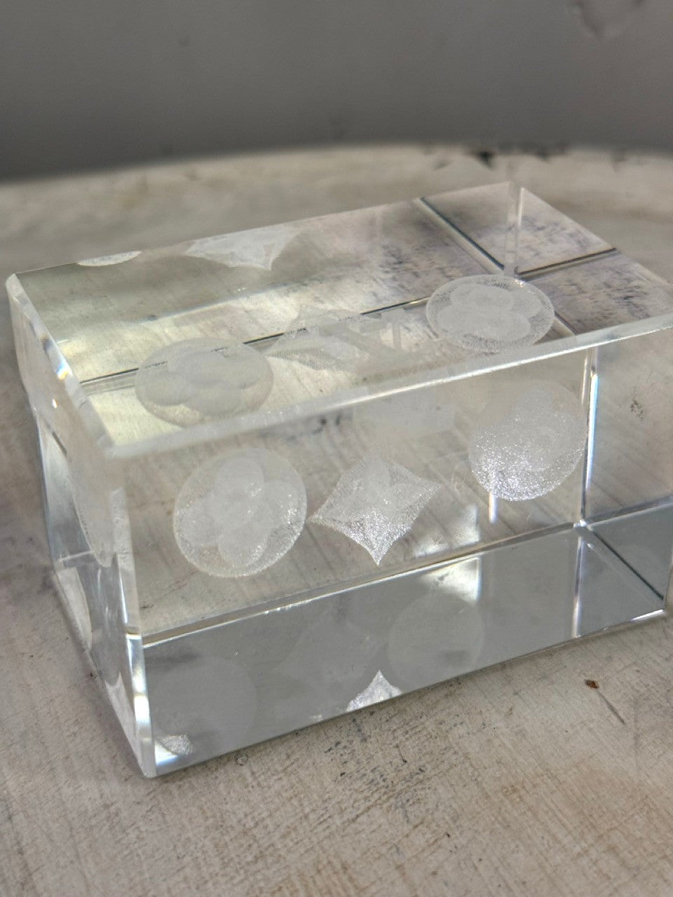 BERLIN VINTAGE CORNER clear crystal paperweight with etched Louis Vuitton monogram and floral motifs. Geometric cube design.