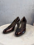 BERLIN VINTAGE CORNER dark brown patent leather embossed crocodile-effect heeled pumps with block heel.