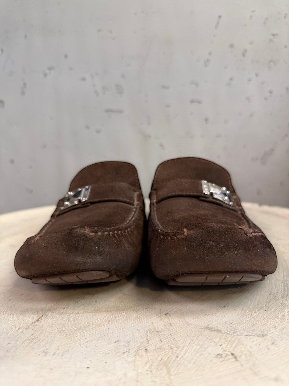 BERLIN VINTAGE CORNER dark brown suede driving loafers with metal detail and moc-toe construction.