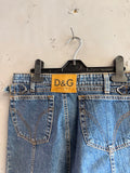 BERLIN VINTAGE CORNER blue denim mini skirt with D&G leather patch and adjustable buckle details.