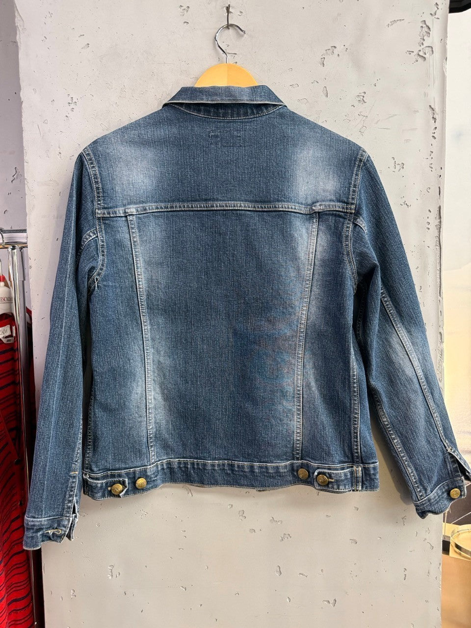 BERLIN VINTAGE CORNER D&G Dolce & Gabbana medium wash denim jacket with metallic buttons and crystal hem details.