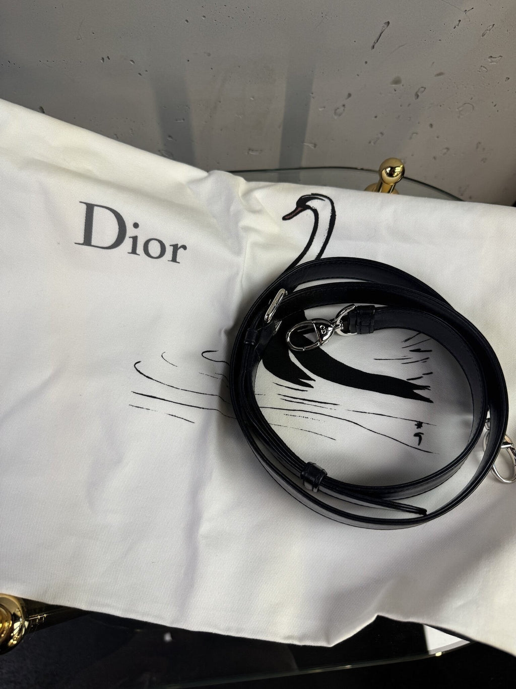 BERLIN VINTAGE CORNER black leather detachable shoulder strap for Christian Dior handbag on a branded white dust bag