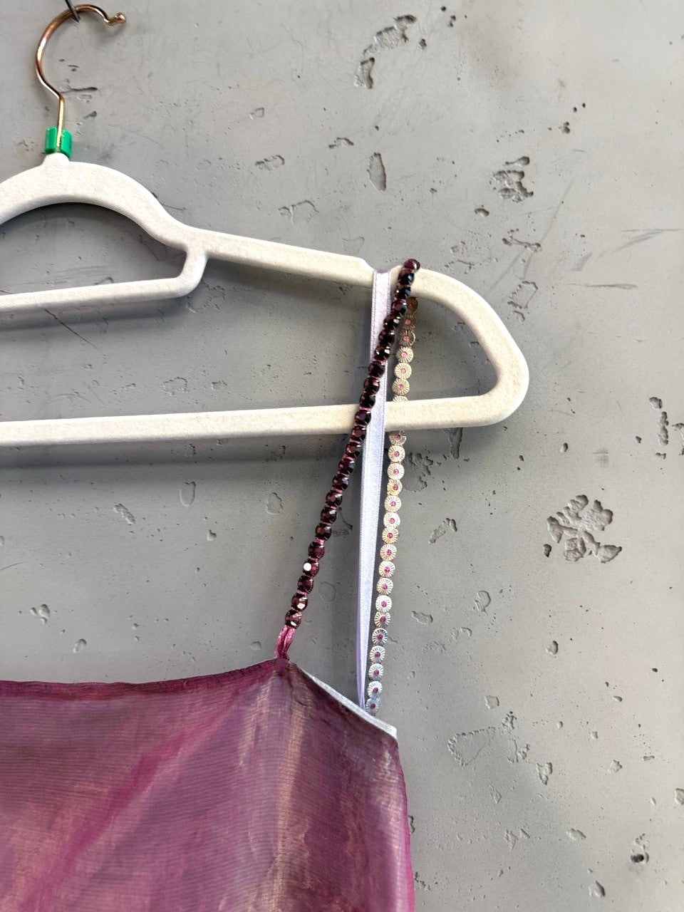 BERLIN VINTAGE CORNER DKNY iridescent pink evening camisole with beaded and sequined straps on a white hanger