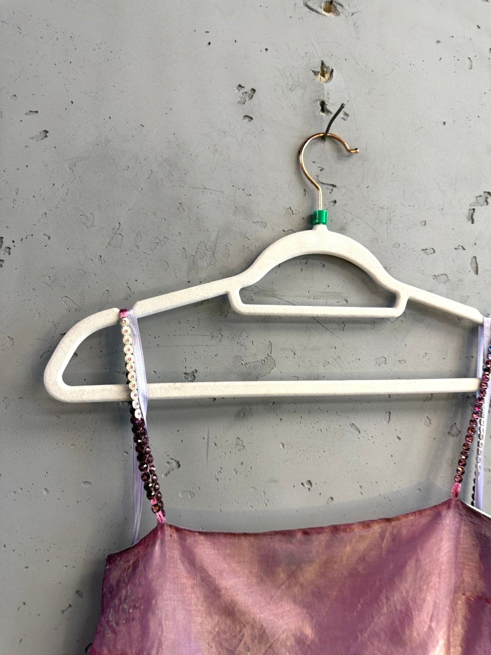 BERLIN VINTAGE CORNER DKNY iridescent pink camisole top with beaded and sequined straps on a hanger