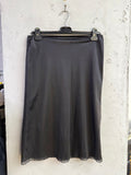 Dolce and Gabbana black satin skirt with lace hem, front view