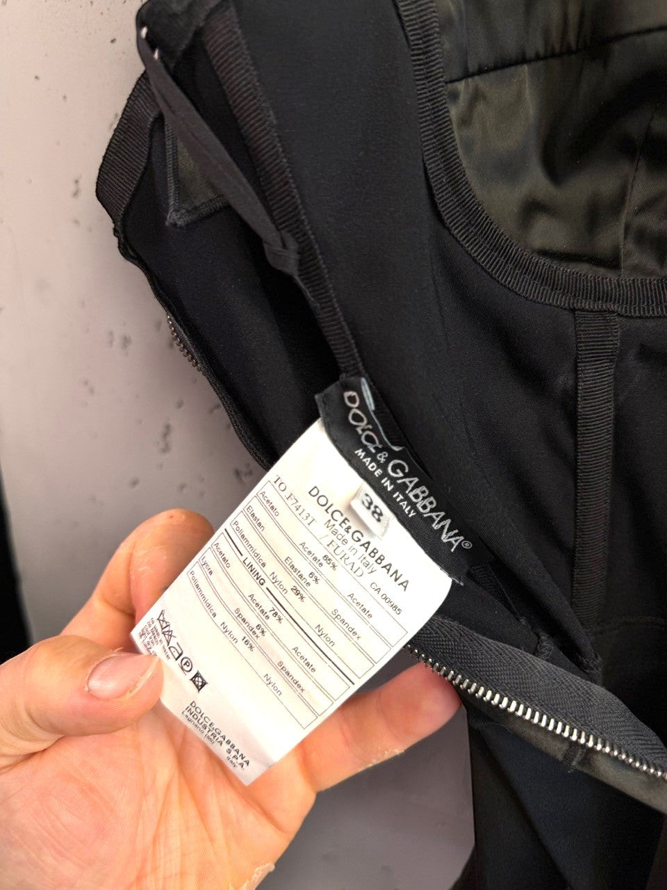 BERLIN VINTAGE CORNER black satin corset top interior garment label showing Dolce and Gabbana branding and material