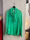 BERLIN VINTAGE CORNER emerald green Dolce & Gabbana silk pussy bow blouse with long sleeves and button-down front.