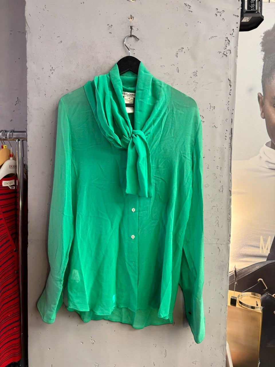 BERLIN VINTAGE CORNER emerald green Dolce & Gabbana silk pussy bow blouse with long sleeves and button-down front.